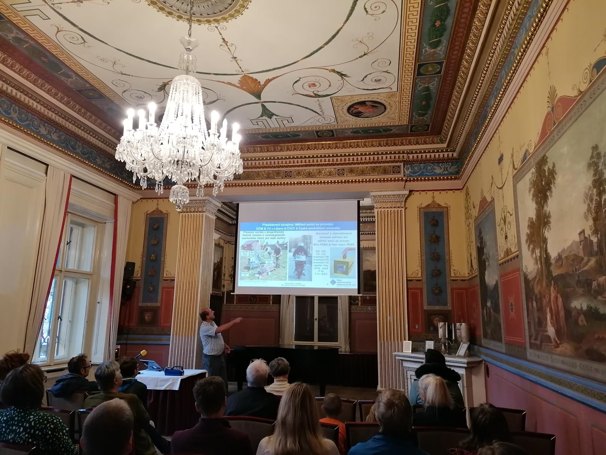 View into the lecture hall to the presenting scientist Michal Vojtíšek